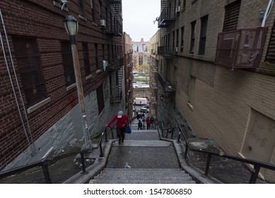 NEW YORK, USA,-NOVEMBER 31,2019: The tourist attraction staircase in Bronx, with a lot of tourists taking photos