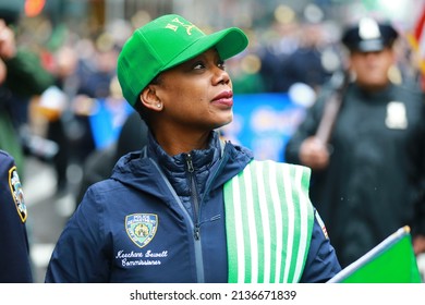 NEW YORK, NEW YORKUSA - March 17, 2022: New York City Police Commissioner Keechant Sewell Holds A Flag While Marching In The St. Patrick's Day Parade In New York. 