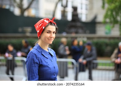 NEW YORK, NEW YORKUSA - NOVEMBER 11, 2021: A Historical Reenactor Dressed As Rosie The Riveter Marches During The Veterans Day Parade In New York On Nov. 11, 2021. (Photo: Gordon Donovan)
