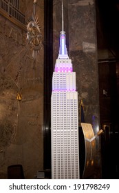 NEW YORK-APR 21, 2014: A Replica Of The Empire State Building Lit In Blue And Purple Lights To Pay Tribute To Fallen NYPD Officers And In Honor Of Police Memorial Week.