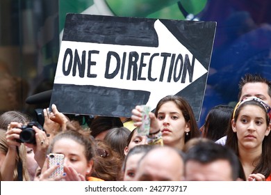 NEW YORK-AUG 23: Fans Hold Signs For One Direction At NBC's 'Today Show' At Rockefeller Plaza On  August 23, 2013 In New York City.