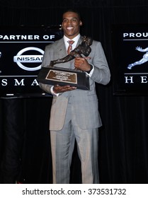 NEW YORK-DEC 11: Cam Newton, Quarterback Of The Auburn University Tigers, Poses With The 2010 Heisman Memorial Trophy Award On December 11, 2010 In New York City.