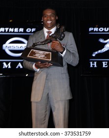 NEW YORK-DEC 11: Cam Newton, Quarterback Of The Auburn University Tigers, Poses With The 2010 Heisman Memorial Trophy Award On December 11, 2010 In New York City.