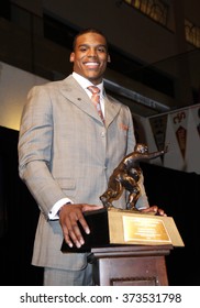 NEW YORK-DEC 11: Cam Newton, Quarterback Of The Auburn University Tigers, Poses With The 2010 Heisman Memorial Trophy Award On December 11, 2010 In New York City.