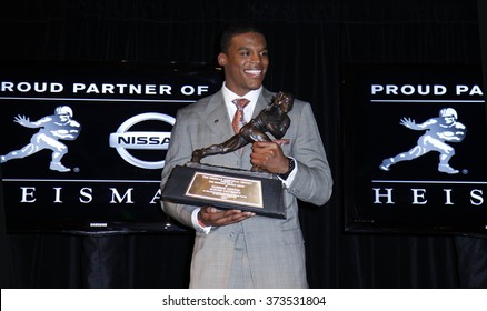 NEW YORK-DEC 11: Cam Newton, Quarterback Of The Auburn University Tigers, Poses With The 2010 Heisman Memorial Trophy Award On December 11, 2010 In New York City.