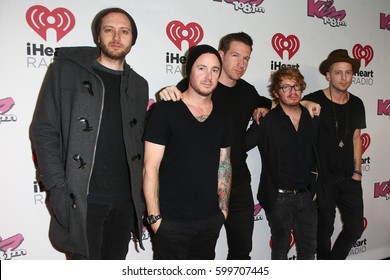 NEW YORK-DEC 14: (L-R) Brent Kutzle, Eddie Fisher, Zach Filkins, Drew Brown And Ryan Tedder Of The Band OneRepublic Attend KISS 108's Jingle Ball 2014 At TD Garden On December 14, 2014 In Boston.