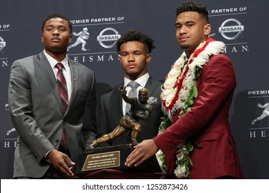 NEW YORK-DEC 8: (L-R) Ohio State Buckeyes Quarterback Dwayne Haskins, Oklahoma Sooners Quarterback Kyler Murray And Alabama Crimson Tide Quarterback Tua Tagovailoa With The Heisman Trophy In New York.