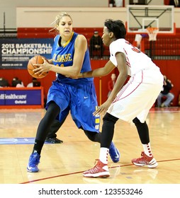 NEW YORK-JAN 2: Delaware Blue Hens Guard Elena Delle Donne (11) Looks To Pass Around St. John's Red Storm Guard Shenneika Smith (35) At Carnesecca Arena On January 2, 2013 In Jamaica, New York.