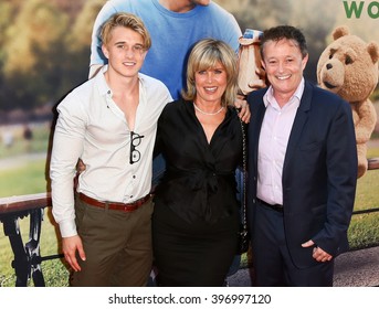 NEW YORK-JUN 24: (L-R) Miles Clark, Kimberly And Producer Jason Clark Attend The 'Ted 2' World Premiere At The Ziegfeld Theatre On June 24, 2015 In New York City.