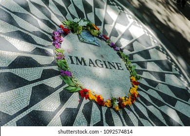 New York,Manhattan,USA.05.08.2018.  The Central Park Memorial, Designed By Bruce Kelly, Strawberry Fields Was Dedicated On  John Lennon's 45th Birthday,with The Caption 