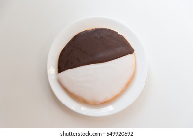 New York's Famous Black And White Cookie On White Table