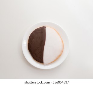 New York's Famous Black And White Cookie On White Table