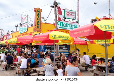 NEW YORK,USA - AUGUST 18,2016 : Customers at the original Nathan's Famous hot dogs stand in Coney Island