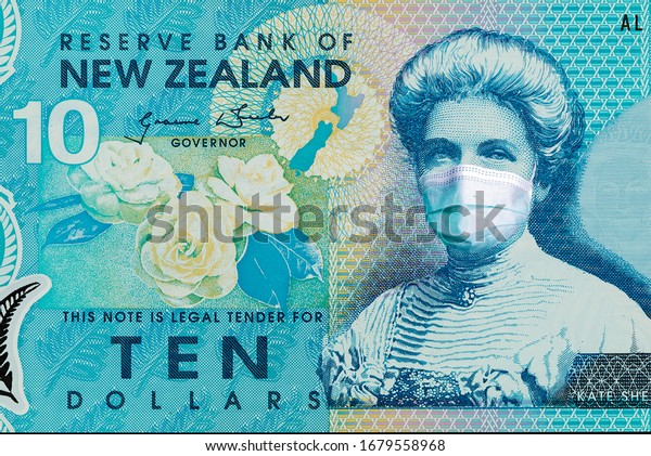 new Zealand 10$ banknotes with a medical\
mask. the coronavirus epidemic in new Zealand. the impact of the\
coronavirus epidemic on the new Zealand\
economy