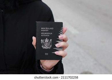 New Zealand Passport In Hand