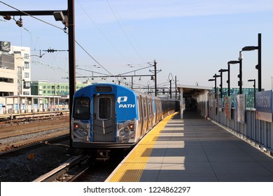 NEWARK, NEW JERSEY, USA - NOVEMBER 1, 2018: PATH Train Arriving To Harrison Station In Newark, New Jersey