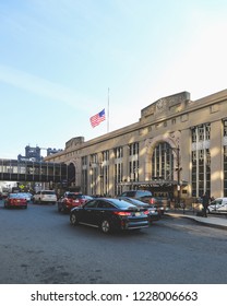 NEWARK, NEW JERSEY, USA - NOVEMBER 1, 2018: Cars and people outside the entrance to Newark Penn station in New Jersey, USA