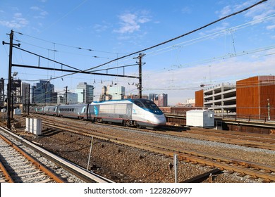 NEWARK, NEW JERSEY, USA - NOVEMBER 1, 2018: Amtrak Acela Express train departures from Newark Penn station in New Jersey, USA