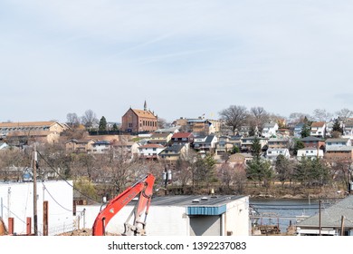 Newark, USA - April 6, 2018: Cityscape of downtown city residential area and construction site in New Jersey with houses homes