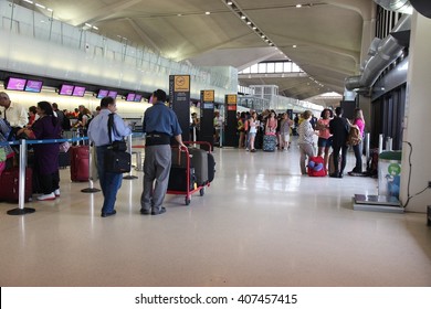 NEWARK, USA - JULY 7, 2013: People wait at Newark Liberty Airport in Newark. With 33.7 millions of total passenger traffic it is the 14th busiest airport in the US (2011).