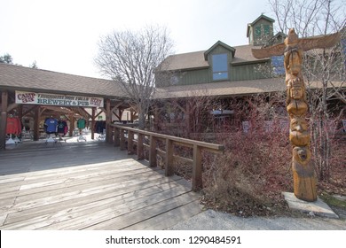 Newberry, Michigan, USA - May 5, 2016: Exterior Of The Camp 33 Restaurant And Microbrewery At Tahquamenon Falls State Park In Michigan. The Pub Specializes In Craft Beers Brewed Locally And On Site.