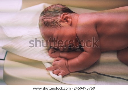 Similar – Baby girl with pompom hat sleeping