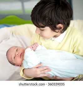 Newborn Baby With Bigger Brother