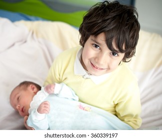 Newborn Baby With Bigger Brother