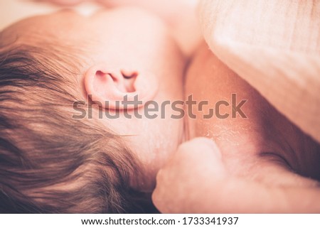 Similar – Baby sleeping on a blanket