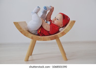 Newborn Baby Boy In A Red Hat