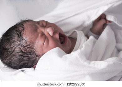 Newborn Baby Crying In Bed - In The  In Concept Portrait