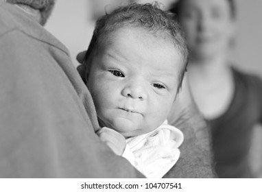 Newborn Baby Girl And Father. Child Abuse Concept.