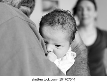 Newborn Baby Girl And Father. Child Abuse Concept.