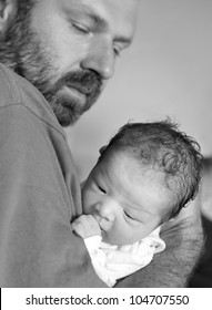 Newborn Baby Girl And Father. Child Abuse Concept.