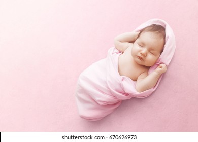 Newborn Baby Girl Sleep On Pink Blanket