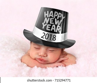 Newborn Baby Girl Wearing A 2018 Happy New Year Hat. 