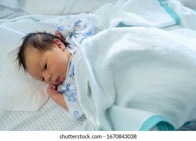 Newborn Baby In Hospital Crib