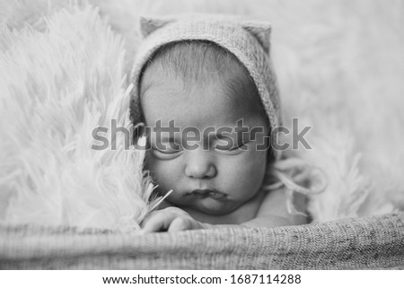 Similar – Baby girl with pompom hat sleeping