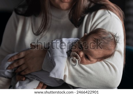 Similar – Baby taking feeding bottle