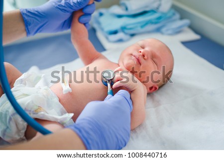 Newborn baby. Little child in medicine hospital. Medical health care. Doctor pediatrician. Small kid, infant in clinic.