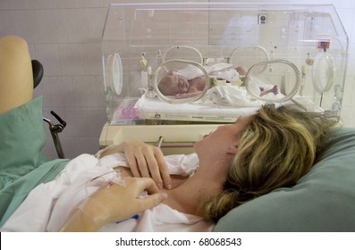 newborn baby with mother after delivery