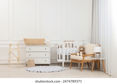 Newborn baby room interior with stylish furniture and comfortable crib - Powered by Shutterstock