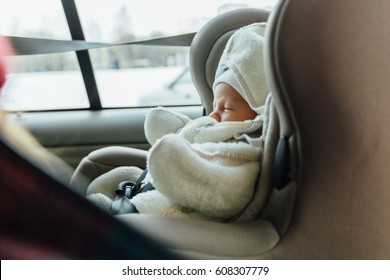 Newborn Baby Sleeping In The Car Seat