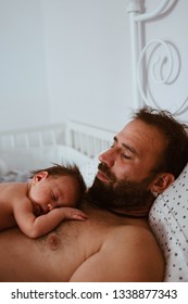 Newborn Baby Sleeping With Dad