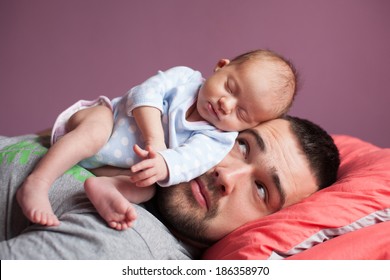 Newborn Baby Sleeping With Father