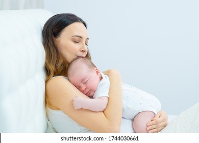 Newborn Baby Sleeps On Her Chest Stock Photo 1744030661 | Shutterstock