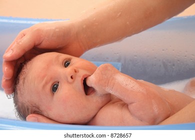 Newborn In The Bath