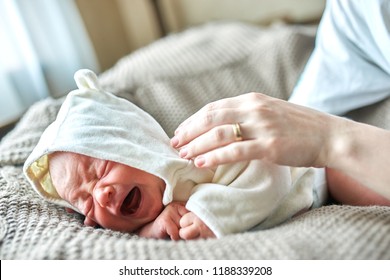 Newborn Crying Baby.New Born Child Tired And Hungry In Bed.Children Cry.Bedding For Kids.Infant Screaming.Healthy Little Kid Shortly After Birth.