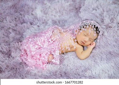 Newborn Cute Baby Infant On Wool Shag Rug Background