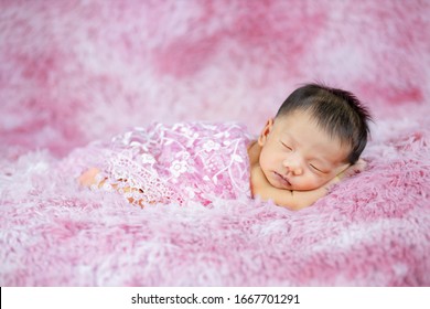 Newborn Cute Baby Infant On Wool Shag Rug Background